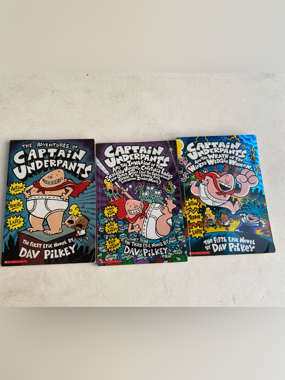 Scholastic Captain Underpants Book Trio - Blue, Purple, Black Covers